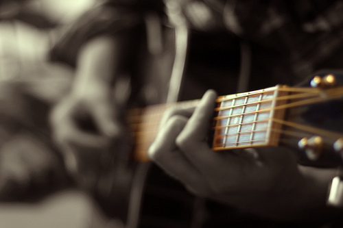 Strumming Guitar